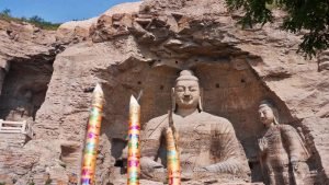 Buda sentado en las Grutas de Yungang